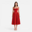 Women's elegant midi dress by FJØRNA featuring a strap A-line design, perfect for wedding guests and formal occasions.