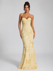 Elegant women's floral embroidered corset maxi dress by FJØRNA featuring a sculpted silhouette and intricate floral embroidery.