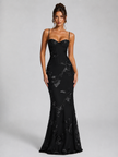 Elegant women's floral embroidered corset maxi dress by FJØRNA, featuring a sculpted silhouette and intricate embroidery.