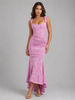 Women's floral corset maxi dress by FJØRNA featuring an asymmetrical hem and sculpted elegant silhouette for wedding guest attire.