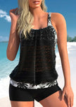 FJØRNA women's tankini set with crochet overlay top and floral print shorts, perfect for beach or poolside wear.