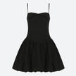 FJØRNA Y2K Bow Bubble mini dress featuring a playful bow design, ideal for party and daytime wear, shown on a model.
