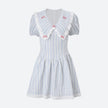 FJØRNA Y2K Chelsea Collar women's mini dress featuring a stylish collar, perfect for party and day wear, shown on a model.