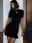 FJØRNA Y2K ribbed women's mini dress featuring a fitted silhouette, perfect for party and daytime wear, shown in a stylish design.