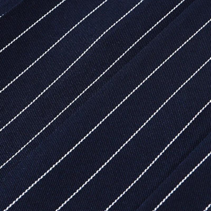 FJØRNA Y2K striped strapless mini dress for women, perfect for party and day wear, featuring bold colorful stripes and a fitted silhouette.