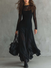 Elegant women's maxi dress by FJØRNA featuring a flowy tulle design, perfect for formal or special occasions.