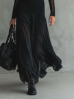 FJØRNA elegant women's maxi dress with flowy tulle fabric, showcasing a stylish and comfortable evening dress design.