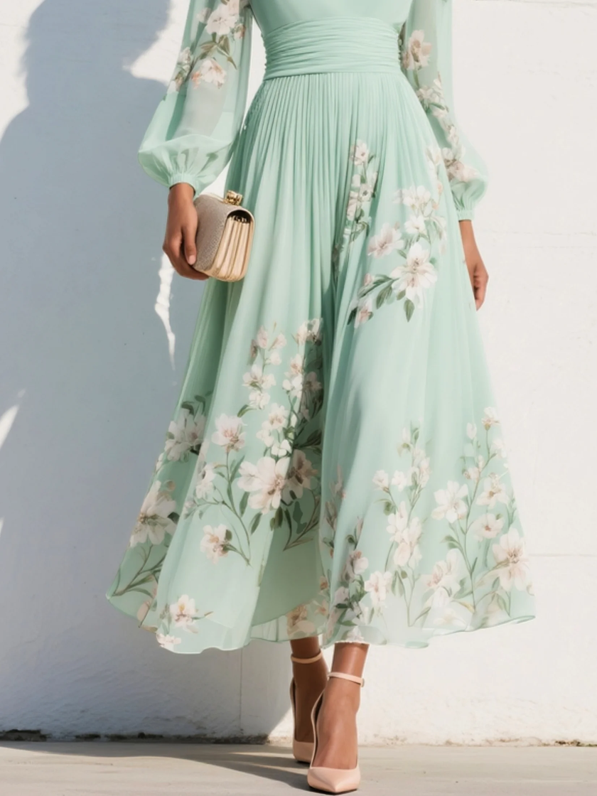 FJØRNA women's summer midi dress with floral pattern, V-neck, and flowy fabric, perfect for warm-weather occasions.