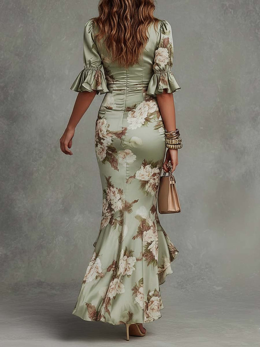 FJØRNA Kassy White Dress, a long elegant dress with flowing fabric and delicate details, perfect for formal occasions.