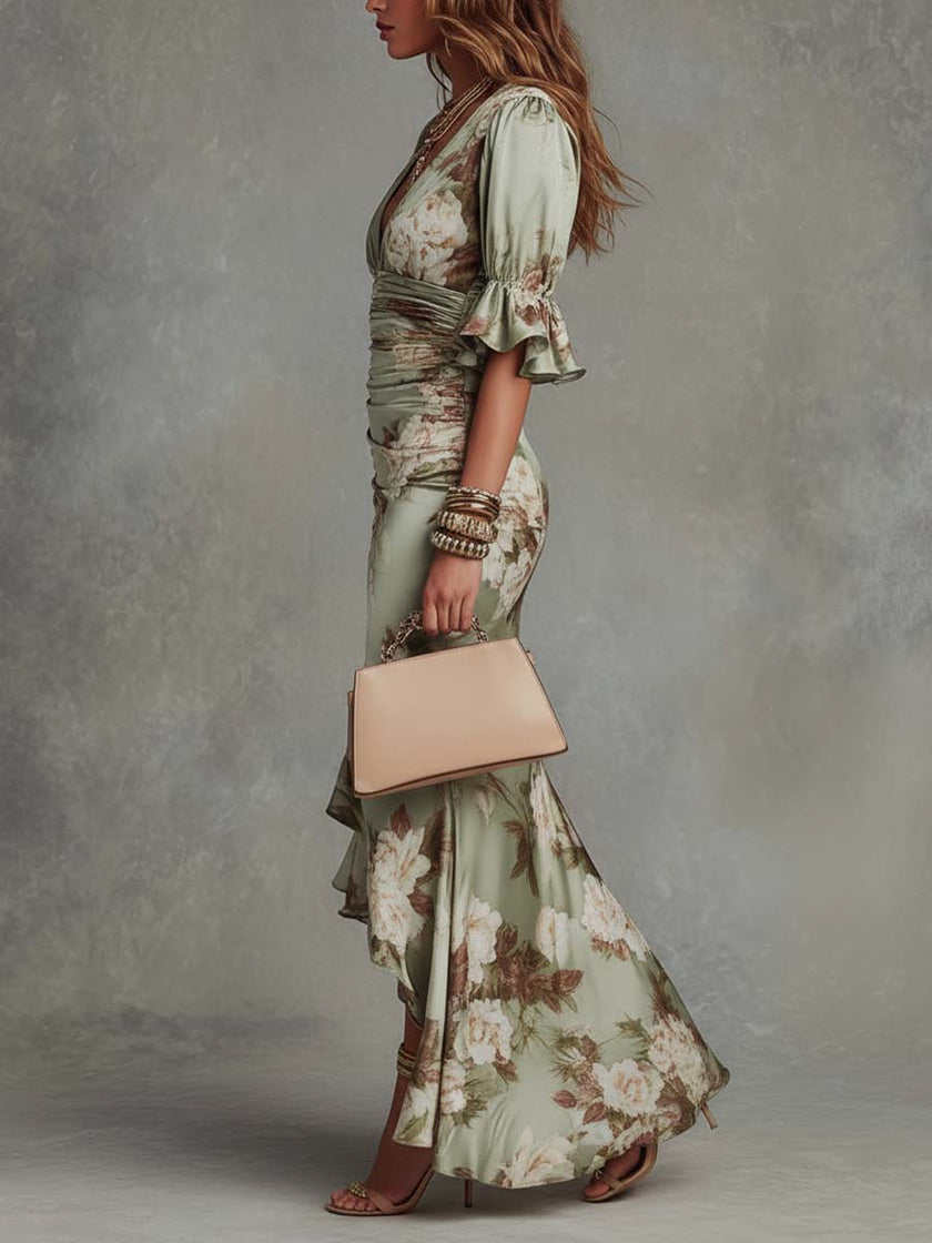 FJØRNA Kassy White Dress, a long elegant dress with flowing fabric and delicate details, perfect for formal occasions.