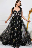 FJØRNA Macy trendy tulle A-line evening dress in black with delicate fabric and elegant design, suitable for formal occasions.