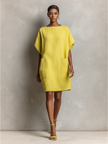 Yellow linen dress for women by FJØRNA, lightweight and flowy with a relaxed fit and sleeveless design.