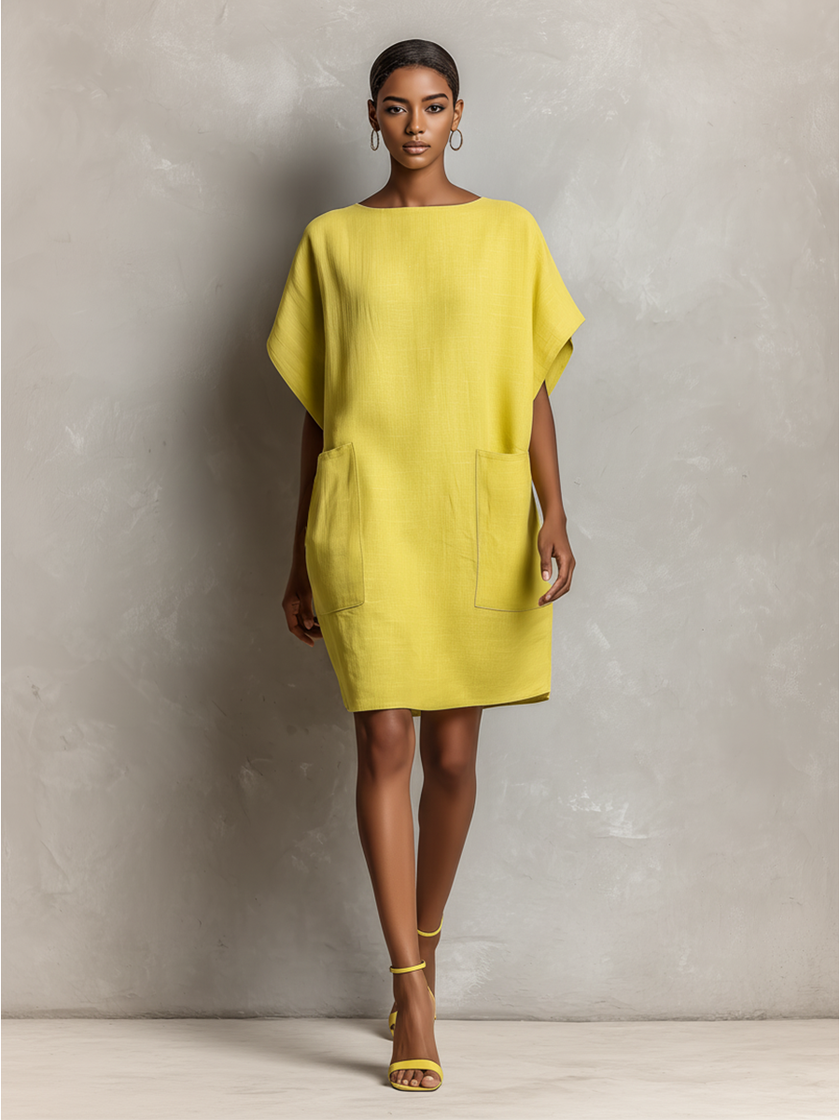 Yellow linen dress for women by FJØRNA, lightweight and flowy with a relaxed fit and sleeveless design.