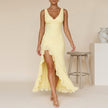 Yellow FJØRNA elegant maxi dress for women with a V-neck and sleeveless design, perfect for sophisticated summer wear.