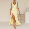 Yellow FJØRNA elegant maxi dress for women with a V-neck and sleeveless design, perfect for sophisticated summer wear.