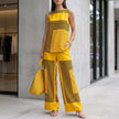 Yellow striped women's two-piece co-ord set with pockets from FJØRNA, perfect for summer casual wear.