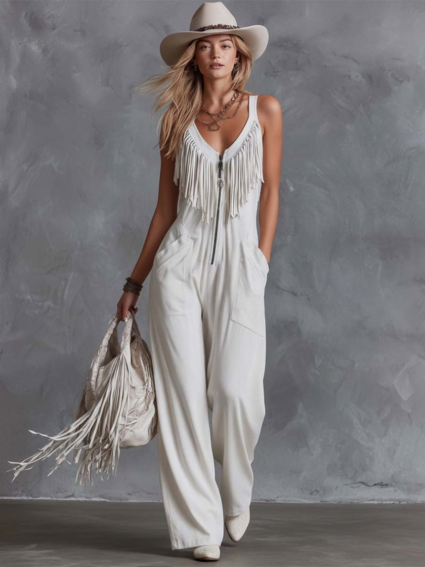 White faux suede Western fringe V-neck jumpsuit for women, featuring stylish fringe details and a V-neck design.