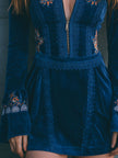 Blue velvet embroidered mini dress by FJØRNA, featuring casual style, long sleeves, and detailed embroidery on a fitted silhouette.