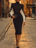 White FJØRNA midi dress for women, featuring a flowy silhouette and elegant design, perfect for casual and semi-formal occasions.