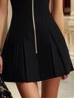 Black sleeveless mini dress for women by FJØRNA, showcasing a fitted silhouette and stylish sleeveless design.