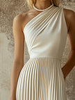 White pleated midi dress by FJØRNA, elegant evening dress with flowing fabric and classic pleats, suitable for formal occasions.