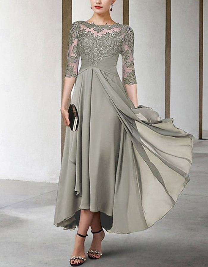 FJØRNA chiffon midi dress for women with A-line silhouette and three-quarter sleeves, elegant and flowy fabric.
