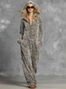 Grey velvet leopard print hooded wide-leg jumpsuit for women, stylish pants by FJØRNA, featuring a hood and relaxed fit.