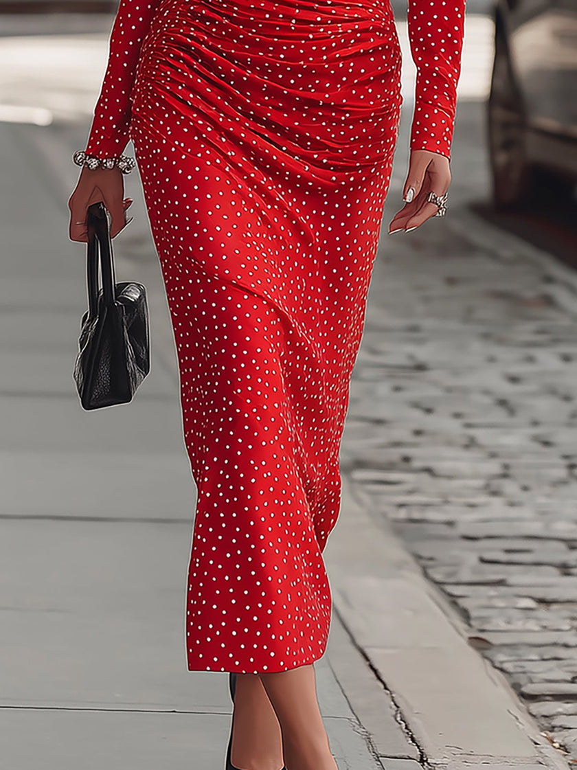 FJØRNA elegant red satin midi dress with polka dots, featuring a fitted waist and flowing skirt, perfect for formal occasions.