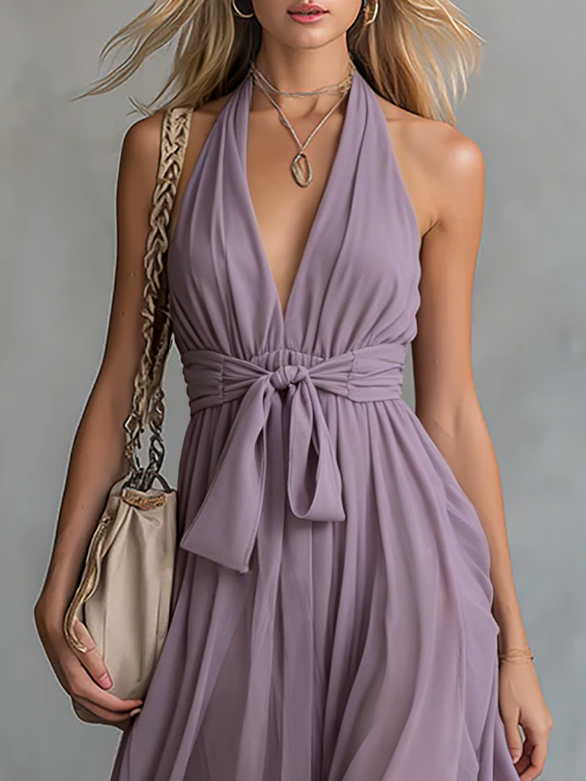 FJØRNA chiffon halter neck maxi dress featuring an elegant design, perfect for evening occasions and formal events.