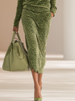 FJØRNA green leopard print velvet top and skirt set, stylish women's pants with bold animal pattern and soft velvet fabric.