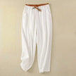 FJØRNA women's lightweight summer trousers, ankle length, breathable fabric for comfortable warm-weather wear.