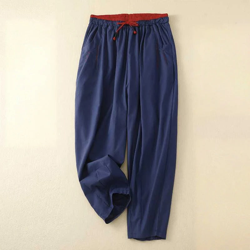 FJØRNA lightweight women's summer ankle-length trousers in breathable fabric, styled for casual wear.