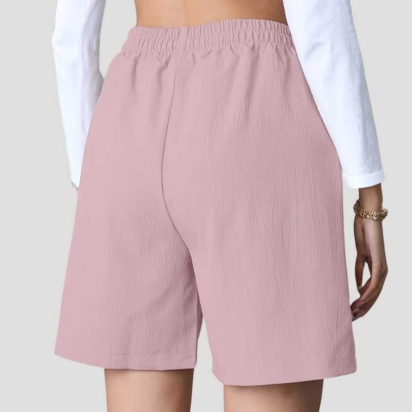 Women's lightweight summer shorts by FJØRNA with wide-leg fit, drawstring waist, and side pockets, perfect for casual warm-weather wear.