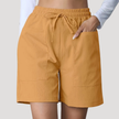 FJØRNA women's lightweight summer shorts with wide legs, drawstring waist, and pocket details, perfect for casual warm-weather wear.