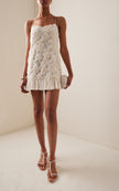 White Rosette Georgette frilled mini dress by FJØRNA featuring delicate rosette details and a flowy, elegant silhouette for wedding guests.