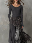 FJØRNA leopard print maxi dress with casual fit, featuring flowing fabric and bold animal print design.