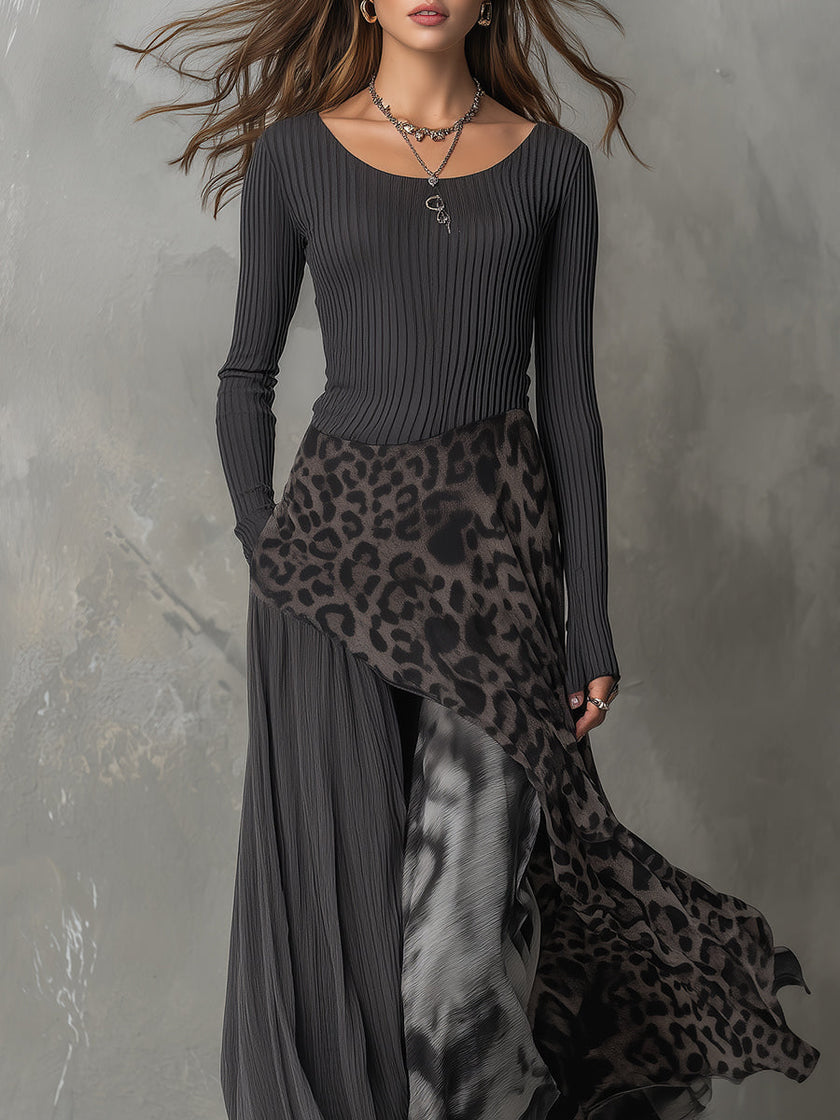 FJØRNA leopard print maxi dress with casual fit, featuring flowing fabric and bold animal print design.