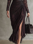 Red faux leather maxi dress by FJØRNA featuring a sleek, flowing silhouette and elegant evening wear design.