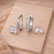 Unisex minimalist jewelry set featuring stainless steel hoops and studs, ideal accessories for women by FJØRNA