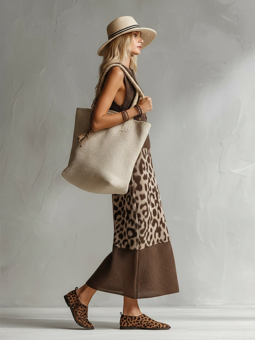 Brown knit leopard print maxi dress by FJØRNA featuring long sleeves and a flowing silhouette, perfect for evening wear.