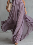 FJØRNA chiffon halter neck maxi dress, elegant evening dress with flowing fabric and sophisticated design, suitable for formal occasions.