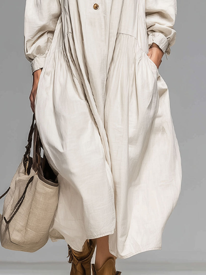 FJØRNA cotton button-front midi dress for women, showcasing a stylish midi-length dress with a button-up front and soft cotton fabric.