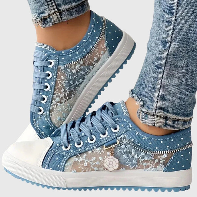 FJØRNA women's orthopedic sneakers with breathable mesh and cushioned insoles, designed for comfort and support.