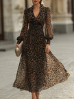FJØRNA leopard print wrap midi dress with long sleeves, stylish and fitted for a chic, trendy look.