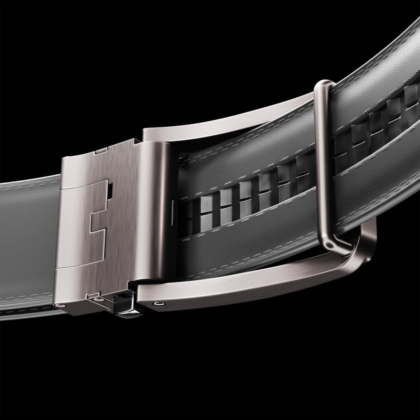 Gray vegan leather ratchet belt by FJØRNA, adjustable unisex belt with a modern buckle design.