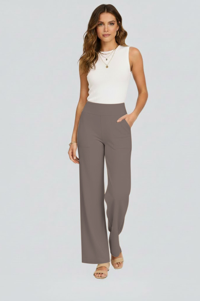 FJØRNA women's lightweight summer trousers with high waist, wide leg design, breathable fabric, and front pockets.
