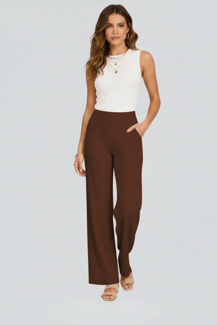 FJØRNA women's high-rise wide-leg summer trousers with pockets, made of breathable lightweight fabric, perfect for warm weather.
