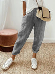 Black FJØRNA women's lightweight summer trousers with straight legs and drawstring waist, perfect for casual warm-weather wear.