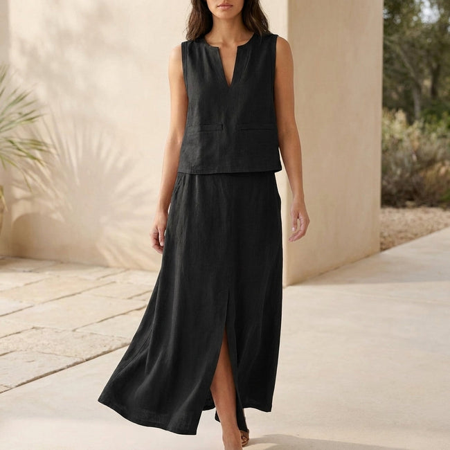 Black women's two-piece co-ord set with pockets and V-neck from FJØRNA, featuring a stylish, coordinated outfit with comfortable fit.