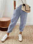 Blue lightweight summer women's trousers with straight leg fit and drawstring waistband by FJØRNA.